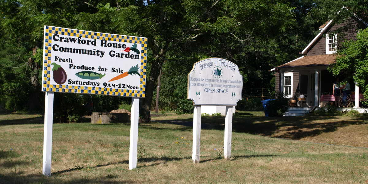 Signs in front of the Crawford House advertising their Farm Stand and the Open Space Commission